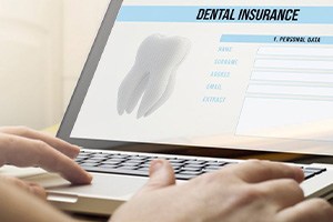 a person looking at a dental insurance form